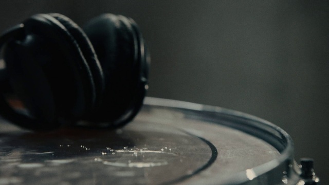 Video Reference: Black, Audio equipment, Headphones, Close-up, Still life photography, Photography, Black-and-white, Colorfulness, Rim