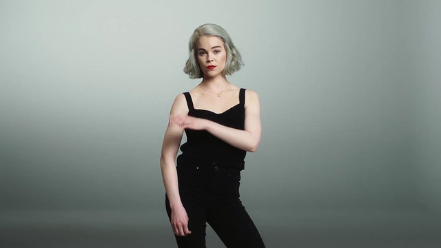 Video Reference: Shoulder, Black, Beauty, Standing, Skin, Blond, Arm, Fashion model, Fashion, Joint, Person