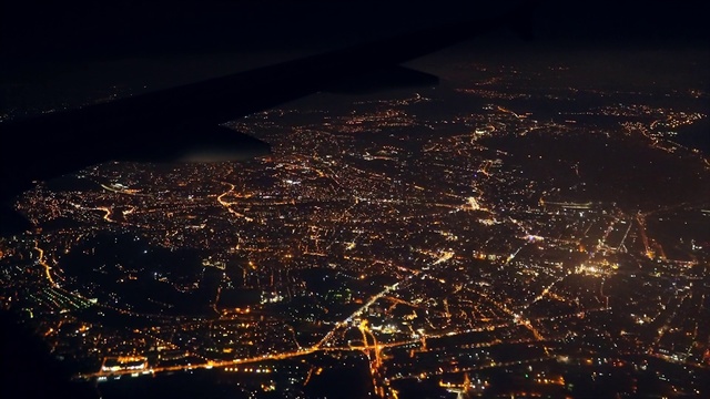 Video Reference: Night, Sky, Aerial photography, Urban area, Metropolitan area, City, Cityscape, Light, Human settlement, Lighting