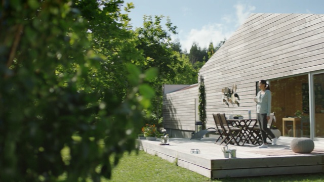 Video Reference: property, home, backyard, house, cottage, tree, yard, plant, real estate, outdoor structure