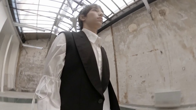 Video Reference: Suit, Photograph, Formal wear, Clothing, Tuxedo, Fashion, Dress, Outerwear, Blazer, Architecture