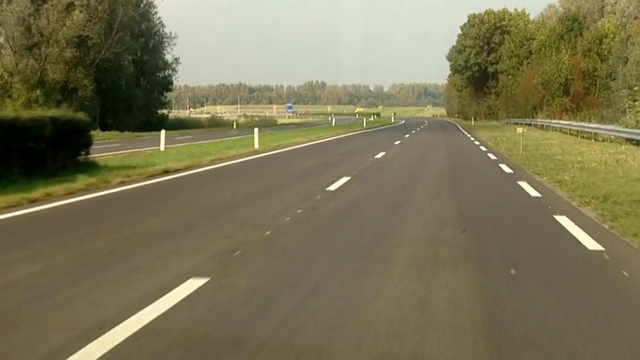 Video Reference: road, lane, highway, asphalt, car, infrastructure, mode of transport, controlled access highway, road surface, shoulder