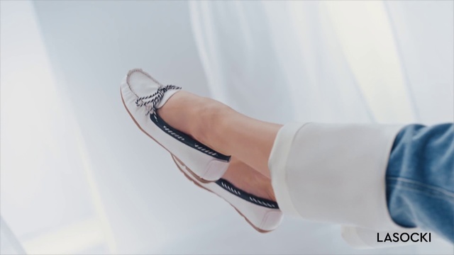 Video Reference: Footwear, White, Shoe, Leg, Ankle, Sandal, Joint, Foot, Human leg, Ballet flat