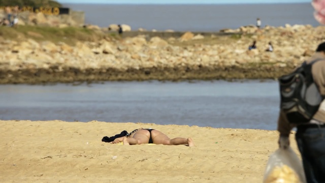 Video Reference: Sun tanning, Beach, Vacation, Sand, Sea, Summer, Leg, Ocean, Caribbean, Coast