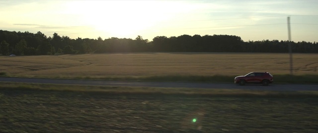 Video Reference: Sky, Morning, Vehicle, Ecoregion, Car, Plain, Evening, Landscape, Sunlight, Performance car