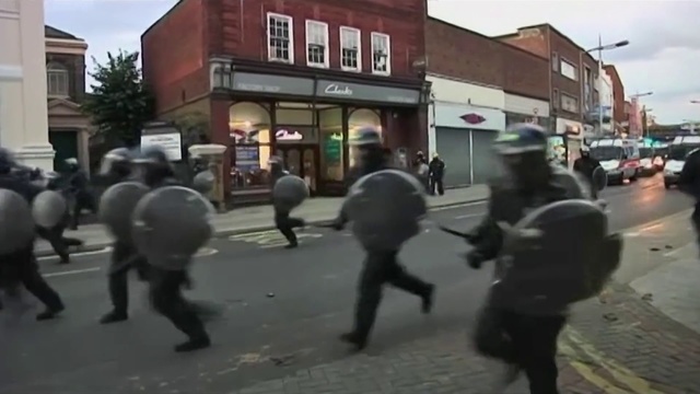 Video Reference: Pedestrian, Mode of transport, Town, Public event, Street, Event, Protest, Marching, Asphalt, Downtown, Person