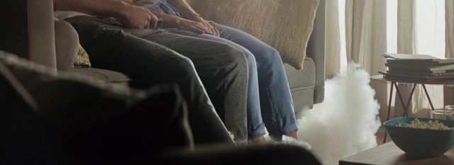 Video Reference: Comfort, Furniture, Couch, Room, Leg, Textile, Bedding, Linens, Chair, Interior design, Indoor, Person, Sitting, Window, Man, Looking, Laptop, Laying, Woman, Bed, Computer, Front, Lying, Table, Young, Using, Cat, Dog, Sleeping, White, People, Remote, Pillow, Clothing, Sofa bed, Sleep, Sofa