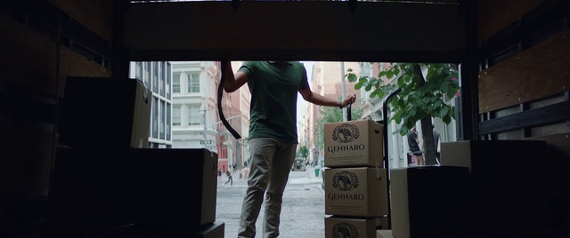 Video Reference: Photograph, Standing, Snapshot, Window, Photography, Tree, Font, Architecture, House, Facade, Person, Building, Man, Front, Sign, Riding, Woman, Young, Street, Holding, Board, Shirt, Walking, Doing, City, White, Table, Trick, Clothing, Text, Footwear, Jeans, Trousers