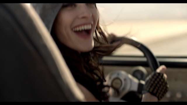 Video Reference: Facial expression, Lady, Smile, Audio equipment, Automotive design, Beauty, Driving, Photography, Mouth, Black hair