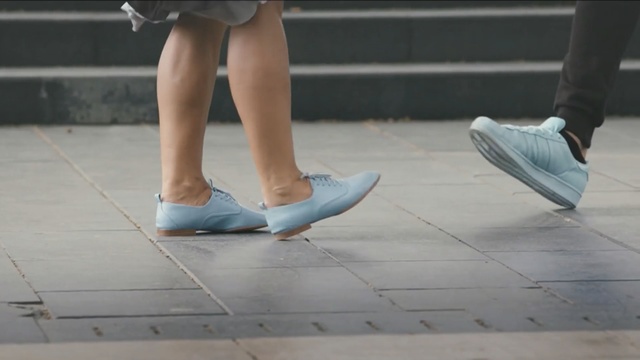 Video Reference: footwear, shoe, leg, floor, foot, flooring, outdoor shoe, human leg, sandal, ankle