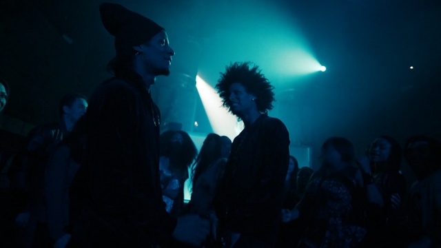 Video Reference: blue, crowd, darkness, entertainment, event, light, night, concert, rock concert, performance, Person