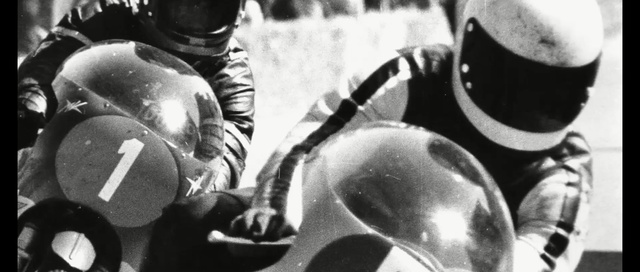 Video Reference: Helmet, Personal protective equipment, Black-and-white, Headgear, Sports gear, Monochrome, Monochrome photography, Team, Football gear