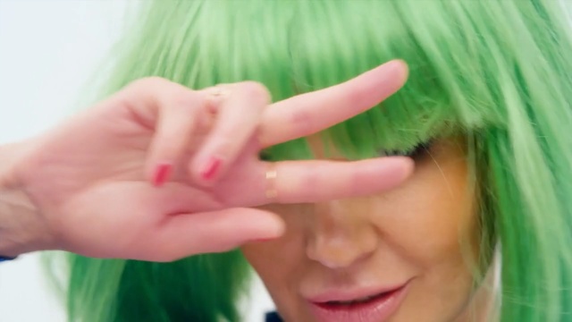 Video Reference: Hair, Face, Green, Forehead, Nose, Facial expression, Eyebrow, Finger, Skin, Cheek