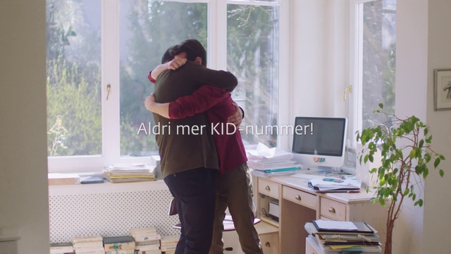 Video Reference: Product, Shoulder, Interaction, Window, Room, Furniture, Hug, Textile, Outerwear, Interior design, Indoor, Person, Young, Standing, Front, Living, Table, Woman, Laptop, Girl, Looking, Computer, Video, Playing, Holding, Man, Little, Using, Bedroom, Remote, Screen, Wearing, Television, Game, Wii, Door, Phone, Kitchen, White, Clothing
