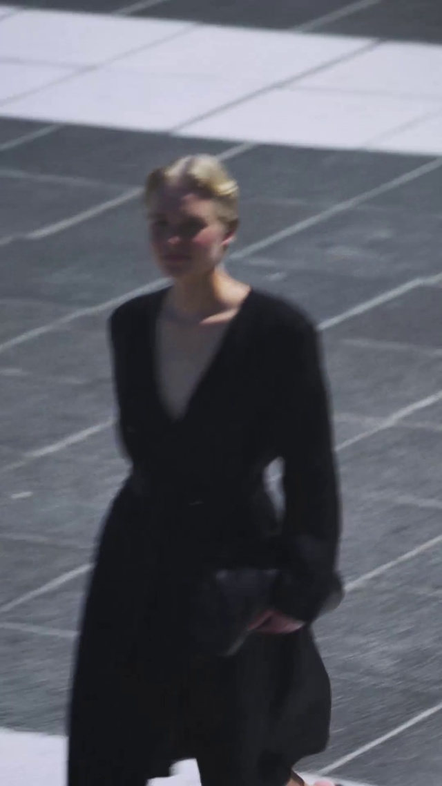 Video Reference: Black, Photograph, Standing, Snapshot, Fashion, Blond, Dress, Human, Photography, Outerwear