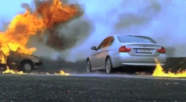 Video Reference: car, motor vehicle, vehicle, mode of transport, stunt performer, explosion, smoke, asphalt, city car, automotive exterior