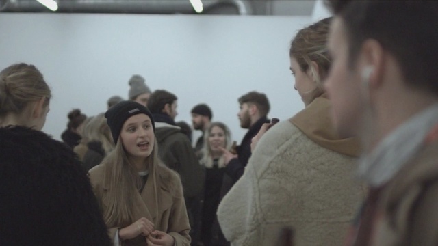 Video Reference: crowd, event, conversation, communication, girl, audience, Person