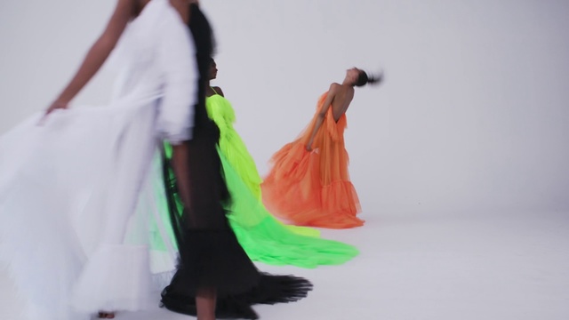 Video Reference: Clothing, Dress, Fashion, Gown, Yellow, Formal wear, Fashion model, Shoulder, Haute couture, Fashion design