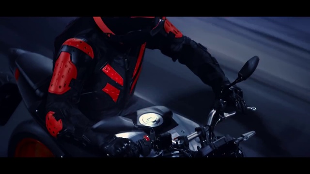 Video Reference: Vehicle, Helmet, Personal protective equipment, Motorcycle, Fictional character, Auto part, Screenshot, Honda, Motorcycle accessories, Car