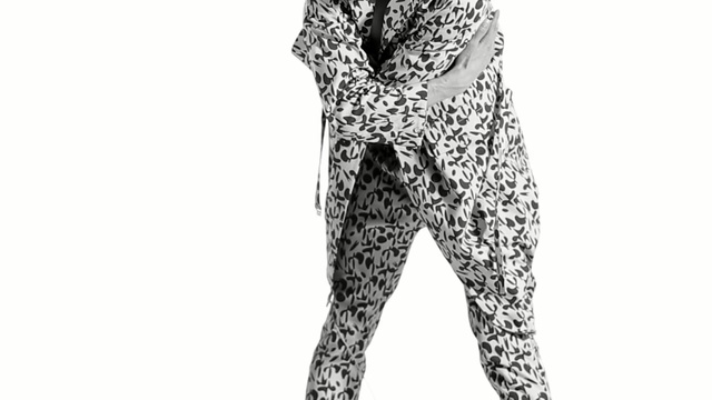 Video Reference: Clothing, Trousers, Leggings, Outerwear, Pajamas, Sleeve, Tights, Black-and-white, Fur, Sportswear, Person