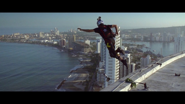 Video Reference: extreme sport, sea, sky, water, recreation, adventure, screenshot, jumping, city