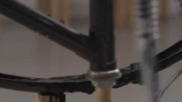 Video Reference: bicycle frame, bicycle, road bicycle, bicycle part, bicycle wheel, wire, material, bicycle saddle, spoke, sports equipment