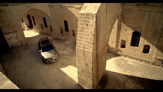 Video Reference: Arch, Architecture, Car, Vehicle, Subcompact car, Historic site, History, City car, Person