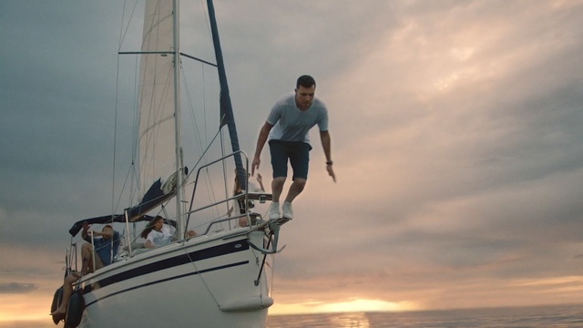 Video Reference: sailing, sky, water, sail, sailing, sailboat, sea, mast, sailing ship, cloud, Person