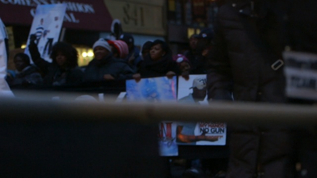 Video Reference: night, crowd, event, darkness, vehicle, Person