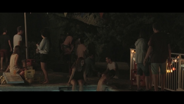 Video Reference: darkness, night, performance art, stage, scene, crowd, fun, screenshot, event, performing arts, Person