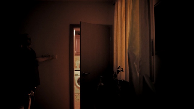 Video Reference: darkness, light, lighting, light fixture, lamp, night, wood, window, shadow, midnight, Person