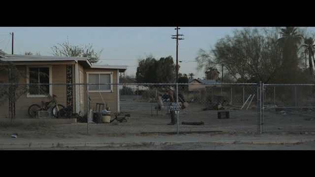 Video Reference: shopping cart, wheeled vehicle, handcart, container, mobile home, conveyance, trailer, housing, structure, landscape