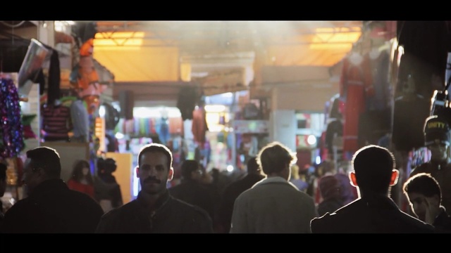 Video Reference: crowd, public space, city, bazaar, night, market, street, fun, Person