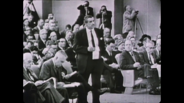 Video Reference: Photograph, People, Social group, Snapshot, Monochrome, Standing, Black-and-white, Photography, Gentleman, Crowd, Person