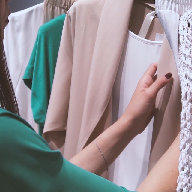 Video Reference: Green, Turquoise, Shoulder, Aqua, Teal, Arm, Hand, Joint, Outerwear, Dress, Person, Indoor, Sitting, Chair, Table, Woman, Man, Food, Cake, People, Shirt, Plate, Eating, Laptop, Holding, White, Computer, Young, Bed, Wedding dress, Fashion accessory