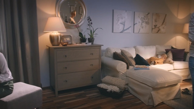 Video Reference: living room, room, home, furniture, interior design, wall, window, bedroom, floor, couch, Person