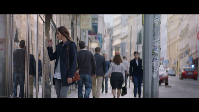 Video Reference: Photograph, People, Snapshot, Street, Pedestrian, Town, Standing, Human settlement, Urban area, Fashion, Person