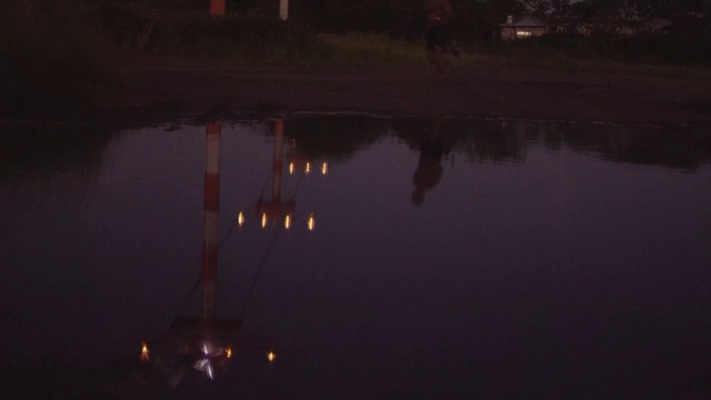 Video Reference: Sky, Water, Night, Reflection, Darkness, Atmospheric phenomenon, Light, Lighting, Atmosphere, Cloud, Person