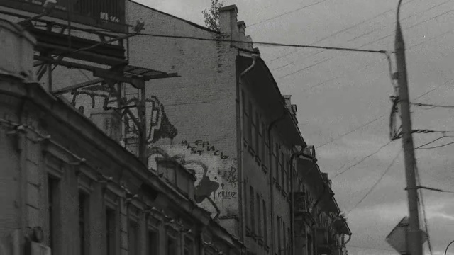 Video Reference: black and white, mode of transport, monochrome photography, town, architecture, structure, building, monochrome, electricity, alley