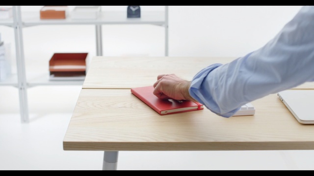 Video Reference: Table, Furniture, Floor, Laminate flooring, Hand, Flooring, Arm, Hardwood, Design, Room, Person