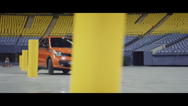 Video Reference: blue, yellow, car, structure, architecture, line, technology, asphalt, hangar, angle