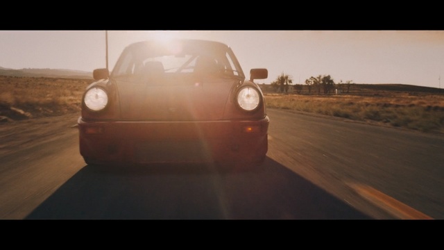 Video Reference: Land vehicle, Vehicle, Car, Automotive design, City car, Vehicle door, Mode of transport, Automotive lighting, Porsche, Volkswagen new beetle, Person
