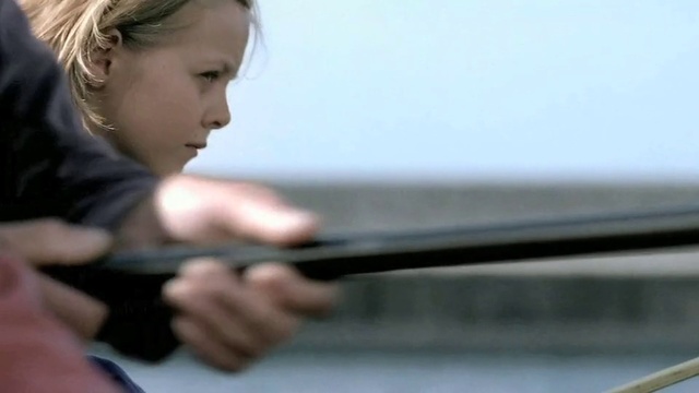 Video Reference: Gun, Firearm, Window, Hand, Windshield, Photography, Sport venue, Glass, Shotgun