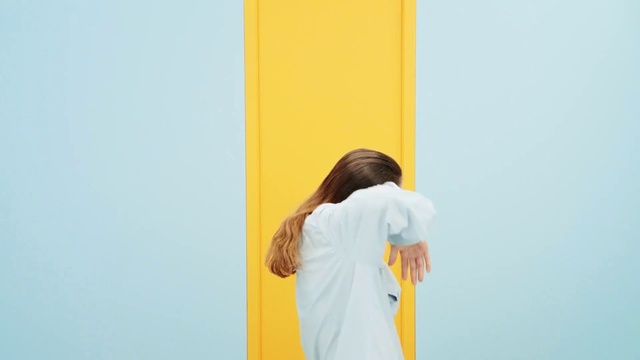 Video Reference: Yellow, Standing, Arm, Wall, Shoulder, Door, Textile, Elbow
