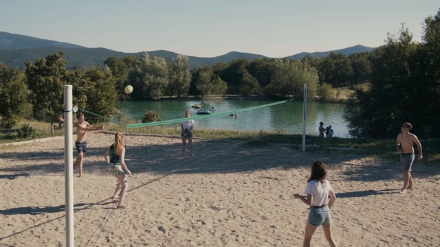 Video Reference: beach, water, leisure, tree, vacation, sand, fun, recreation, tourism, sky, Person