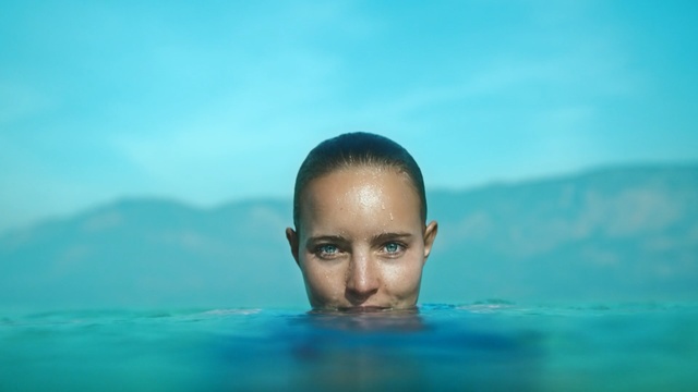 Video Reference: Face, Blue, Water, Head, Skin, Forehead, Chin, Aqua, Fun, Sky, Person