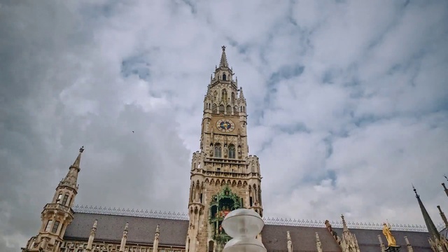 Video Reference: Cloud, Sky, Building, Tower, Skyscraper, World, Clock, Landmark, City, Facade