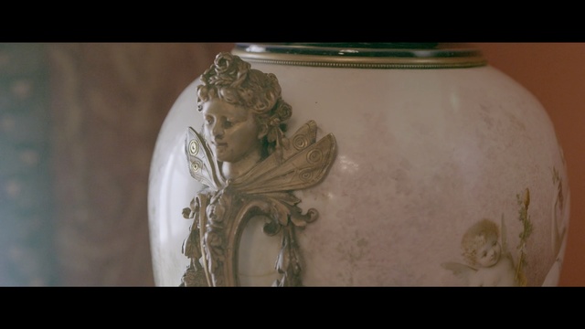 Video Reference: artifact, carving, ceramic, stone carving, porcelain, sculpture, material, vase, relief, classical sculpture, Person