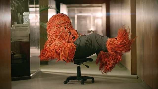 Video Reference: Orange, Chair, Furniture, Room, Floor, Art, Person