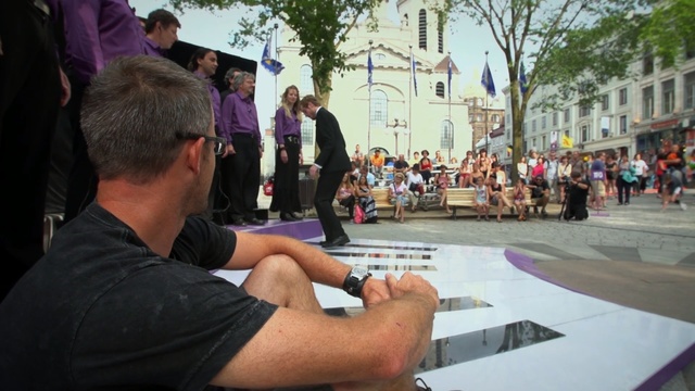 Video Reference: event, street, recreation, pedestrian, vehicle, crowd, Person